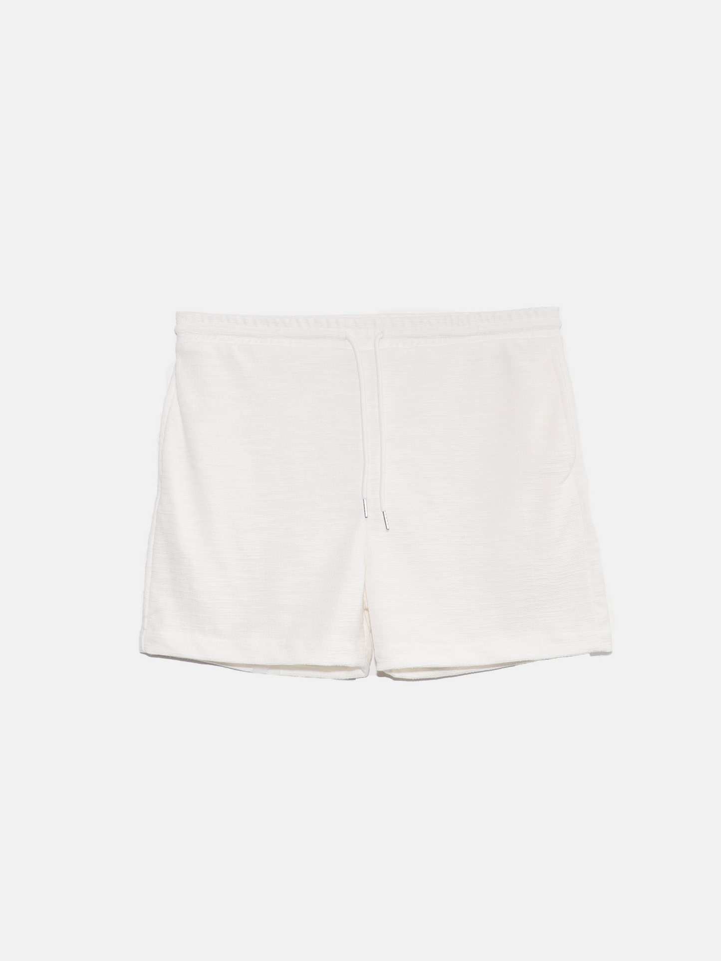 short blanc texturé
